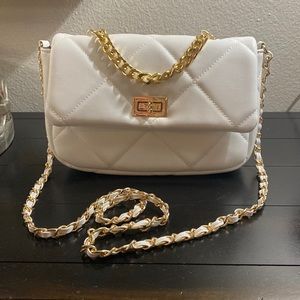 White purse with gold chain